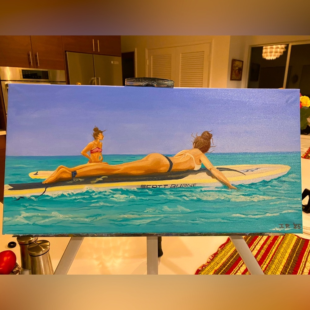 Oil painting of Girls on Surf Boards measuring 10” X 20”.